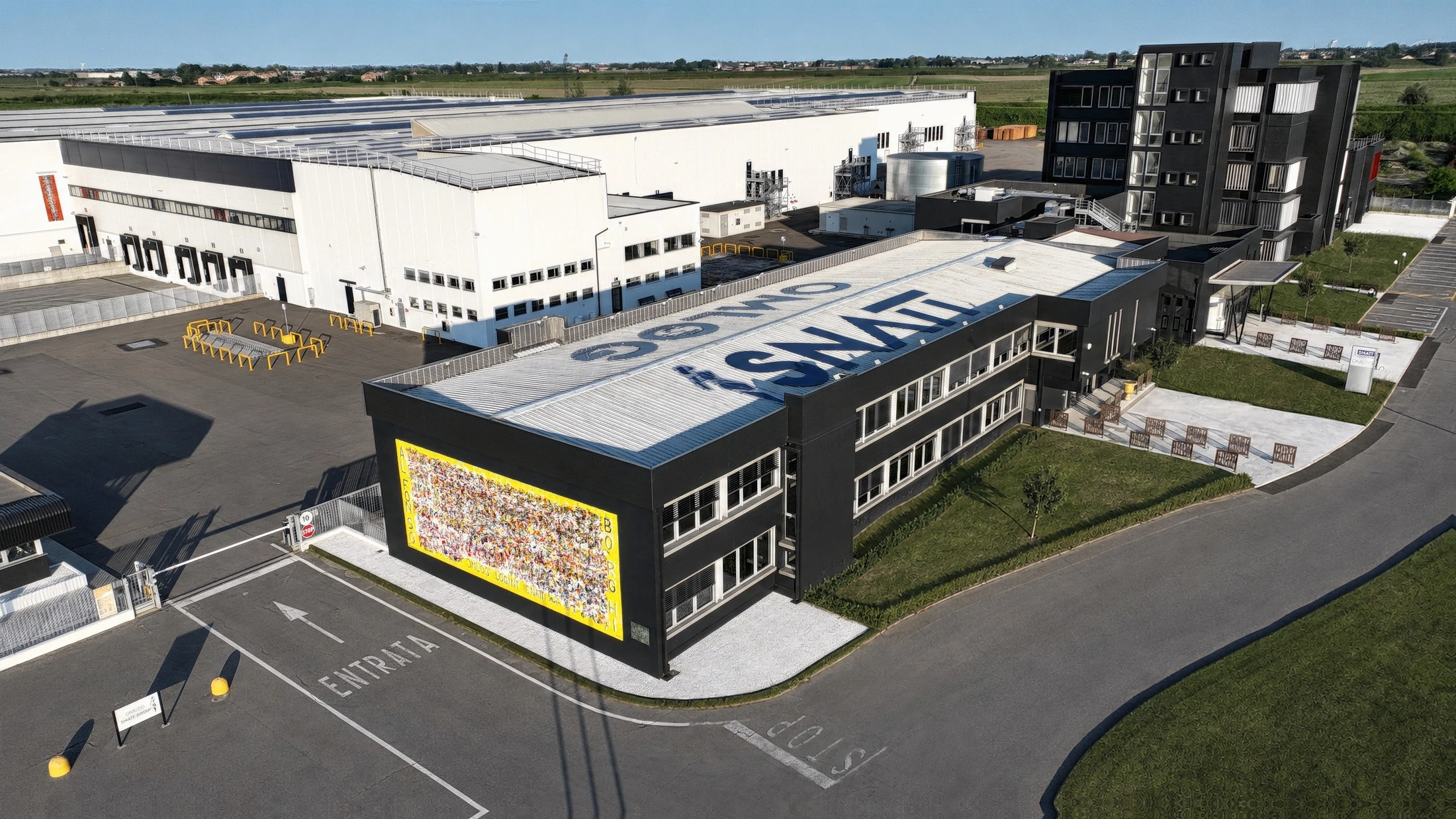 Aerial view of a logistics hub compound with yards, courtyards and warehouse buildings